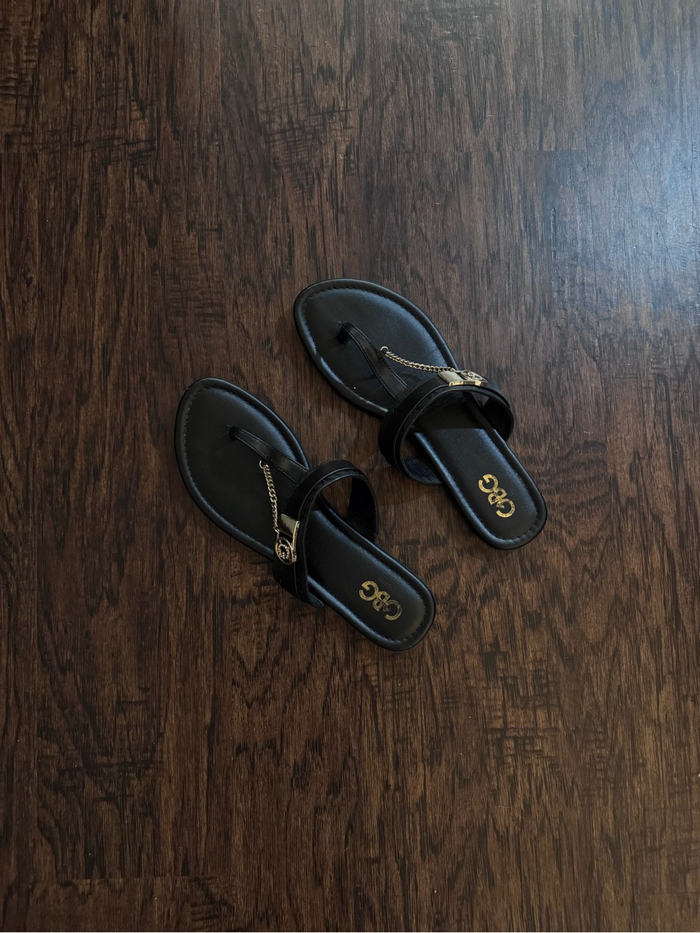 G by Guess Black Thong Sandals with Gold Chain Detail